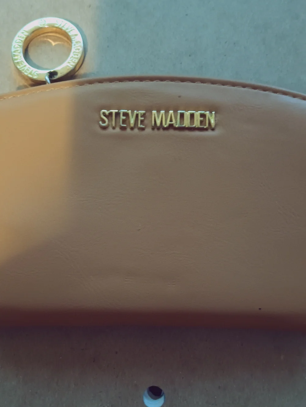 Steve Madden Tan Clutch with Gold Logo Accent
